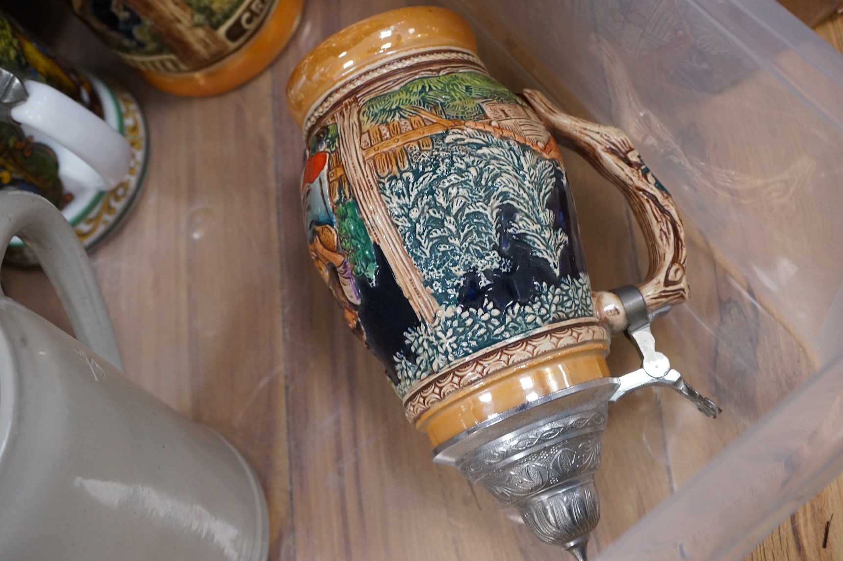 A collection of German ale steins and an Imari seated cat-37cm high